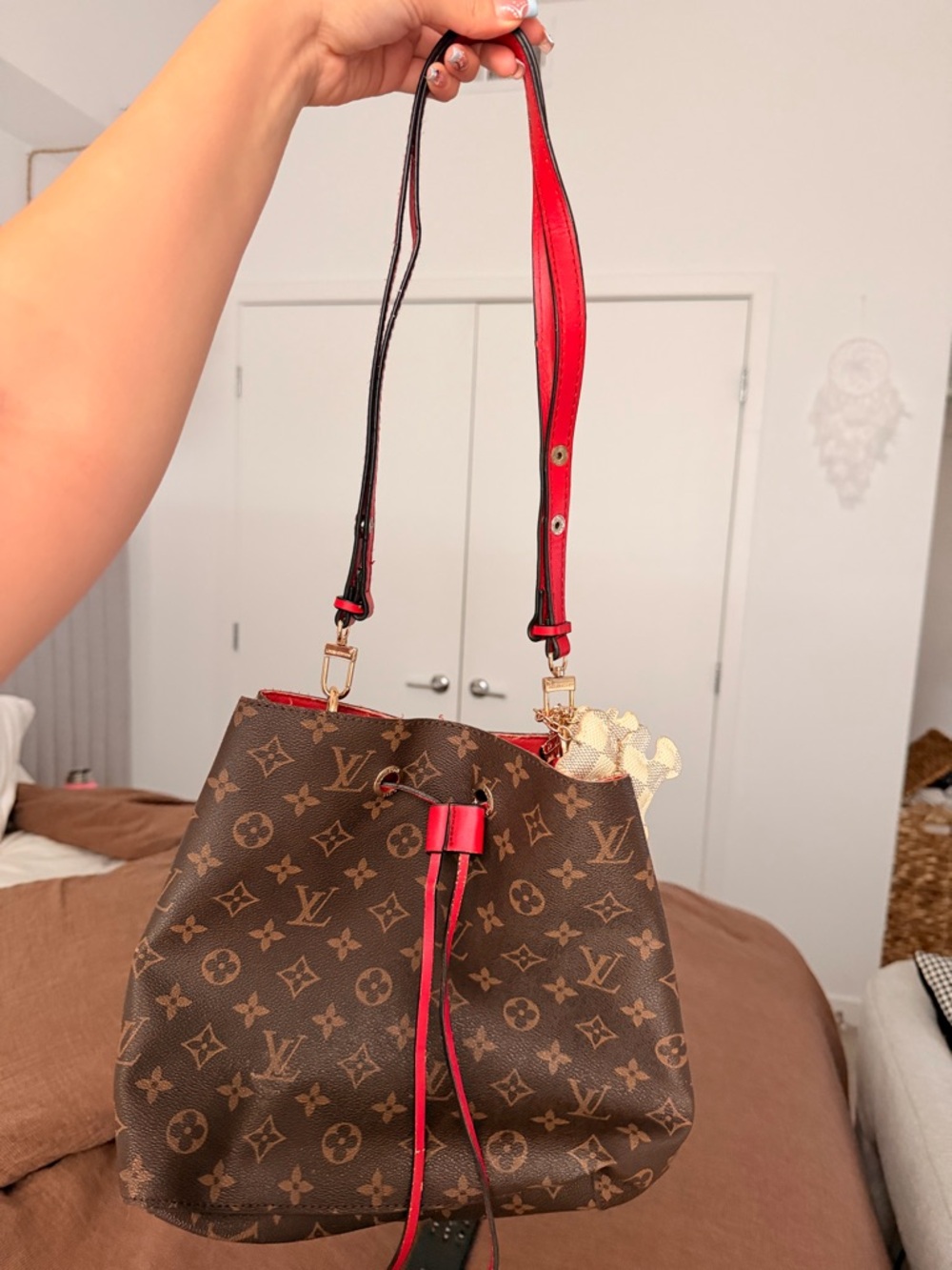 Brown Monogram Bucket Bag with Red Trim